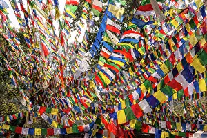 Kathmandu Prints: Frame covered in colorful Tibetan prayer flags