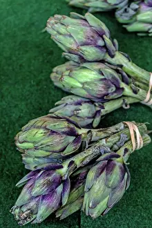 Gourmet Prints: Fresh artichokes from France arranged on a green surface ready for cooking and enjoying