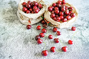 Still Life Prints: Fresh ripe cherries on a table at springtime, Italy, Europe