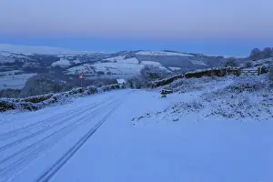 Steps And Staircases Prints: Fresh snow on country lane, winter pre-dawn blue hour