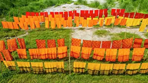 Hanging Prints: Freshly dyed cloths hanging in Araihazar village