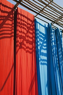 Fabric Prints: Freshly dyed fabric hanging to dry, Sari garment factory, Rajasthan, India, Asia