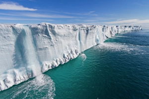 Glacial Prints: Freshwater melt forming waterfalls in Austfonna
