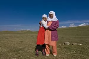 Friendly Nomad mother and daughter, Song Kol, Kyrgyzstan, Central Asia, Asia