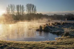 Flowing Water Prints: Frosty winter sunrise with mist on the River Test on Chilbolton Cow Common SSSI (Site of Special Scientific Interest)