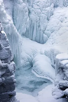 Icicle Prints: Frozen Athabasca Falls in mid-winter, Banff national park, Canada