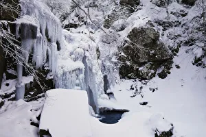 Cascata Del Dardagna Prints: Frozen Dardagna waterfalls in winter with snow, Parco Regionale del Corno alle Scale