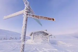 Muonio Prints: Frozen signage and wood hut, Pallas-Yllastunturi National Park, Muonio, Lapland, Finland