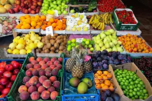 Stalls Prints: Fruit is displayed for sale at a market in Paspatur