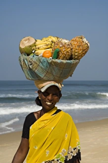 Sari Prints: Fruit vendor on beach near the Leela Hotel