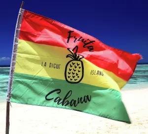 Bright Prints: Fruta Cabana flag waving on Anse Source dArgent beach in Seychelles during sunny day