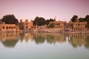 Images Dated 24th November 2007: Gadi Sagar illuminated at dusk, Jaisalmer, Western Rajasthan, India, Asia