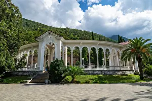 Columns Prints: Gagra Colonnade in Gagra Abkhazia shows architecture and landscape under a cloudy sky