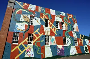 Vibrant Colour Prints: The game of snakes and ladders painted on a wall of