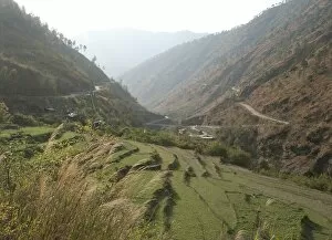 Terraced Collection: Gamri Chhu River running through the Trashigang Valley past terraced hills of rice fields