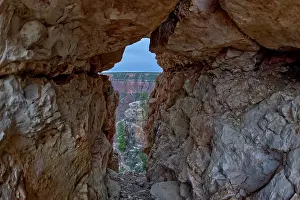 Boulder Prints: A gap between a stack of balanced boulders on a cliff east of Grandview Point at Grand Canyon South Rim