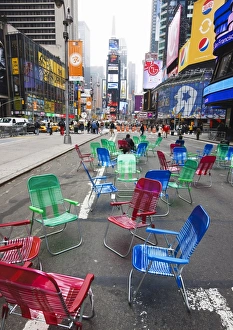 Garden chairs in the road for the public to sit and relax in the pedestrian zone Garden chairs in the road for the public to sit and relax in the pedestrian zone