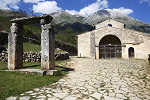 Pavements Prints: The Gate of Paradise, the Church of Santa Maria in Valle with Mount Velino in