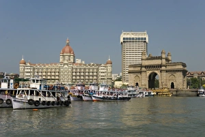 Mumbai Prints: Gateway of India on the dockside beside the Taj Mahal Hotel, Mumbai, India, Asia