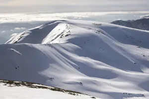 Gentle mountains fully covered by snow in the Corno alle Scale regional park, Emilia Romagna, Italy, Europe Gentle mountains fully covered by snow in the Corno alle Scale regional park, Emilia Romagna, Italy, Europe