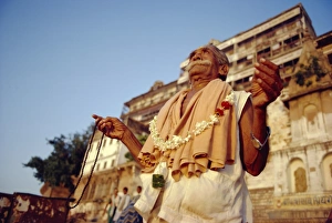 Signaling Prints: Ghatia meditating in earling morning on the ghats by