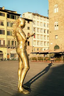 Creativity Prints: Giant bronze statue of a woman by Thomas J Price in a public square in Florence