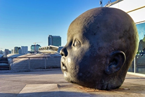 Giant Prints: Giant Child Statue Head Titled Day, Atocha Train Station, Madrid, Spain