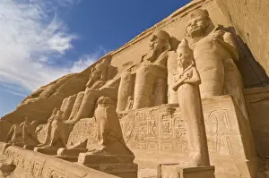 Giant statues of the great pharaoh Rameses II outside the relocated Temple of Rameses II at Abu Simbel, UNESCO World Heritage Site, Egypt, North