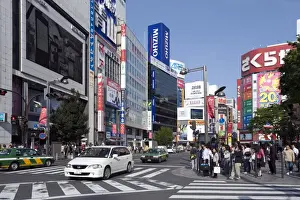 Shinjuku Prints: Giant Studio Alta TV screen in East Shinjuku district of Tokyo in front of the JR train station