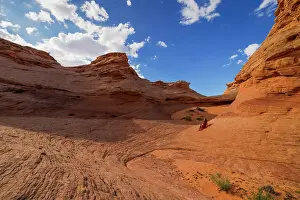 Mid Adults Prints: A girl admires the beautiful landscape of rock formations near the town of Page