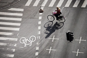Child Prints: Girl on bicycle at crossroads, Copenhagen, Denmark, Scandinavia, Europe