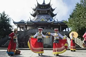 Images Dated 3rd November 2008: Girls dancing in traditional costume, Zhangjiajie Forest Park, Wulingyuan Scenic Area