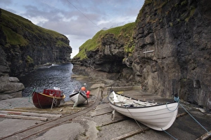 Gjogv harbour, set in a 200m-long natural cleft in the rock, Eysturoy, Faroe Islands