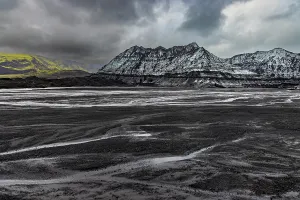 Glacial Prints: Glacial meltwater patterns interact with volcanic plains near Katla glacier in Iceland displaying changes