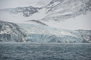 Elephant Island Prints: Glacier flowing down a mountain on Elephant Island, South Shetland Islands, Antarctica