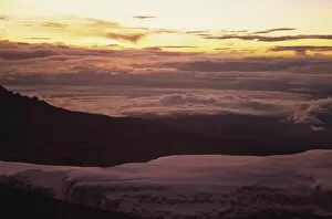 Dramatic Skies Collection: Glacier at sunrise on summit of Kibo, 5895m, Kilimanjaro National Park