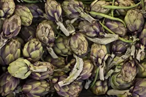 Pile Prints: Globe artichokes, one of the local vegetables at the Sunday morning market