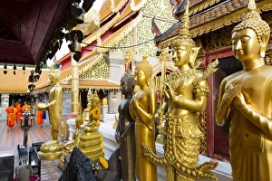 Typically Thai Prints: Gold Buddhas at Doi Suthep temple, Chiang Mai, Thailand, Southeast Asia, Asia