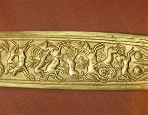 Treasure Prints: Detail of the gold sheath of one of the kings daggers showing animals in a hunting scene