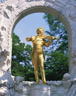 Vienna Prints: Gold statue of the musician Johann Strauss in Vienna, Austria, Europe
