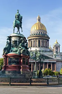 Domes Prints: Golden dome of St. Isaacs Cathedral built in 1818 and the equestrian statue of Tsar