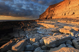 Boulders Prints: Golden evening light on limestone cliffs