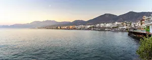 Crete Prints: Golden hour view of coastline and beach in Limenas Chersonisou Crete Greece