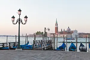 Gondolas moored on the Lagoon, San Giorgio Maggiore beyond, Riva degli Schiavoni
