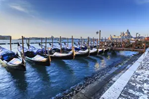 Lined Up Prints: Gondolas with view to Basilica di Santa Maria della Salute after snow, Venice, UNESCO