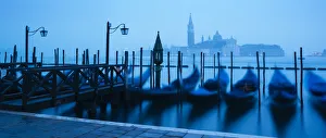 Gondola Prints: Gondolas on the waterfront of St. Marks Basin at dawn, Venice, UNESCO World Heritage Site