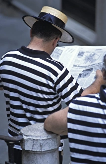 Paper Prints: Gondolier reading newspaper