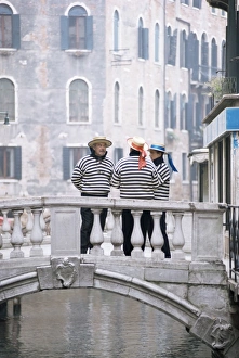 Mature Men Prints: Gondoliers chatting on bridge