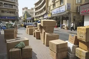 Images Dated 16th September 2009: Goods stacked on the sidewalk, Deira, Dubai, United Arab Emirates, Middle East