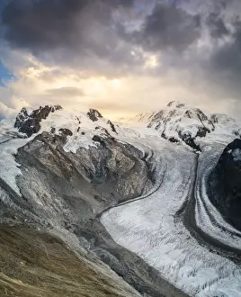 Gorner Glacier (Gornergletscher) with majestic Lyskamm and Monte Rosa peaks at sunset